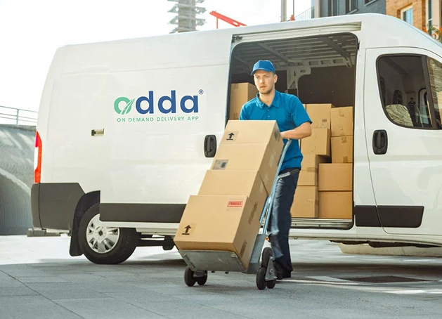 Odda Driver Unloading Delivery Van with Trolley